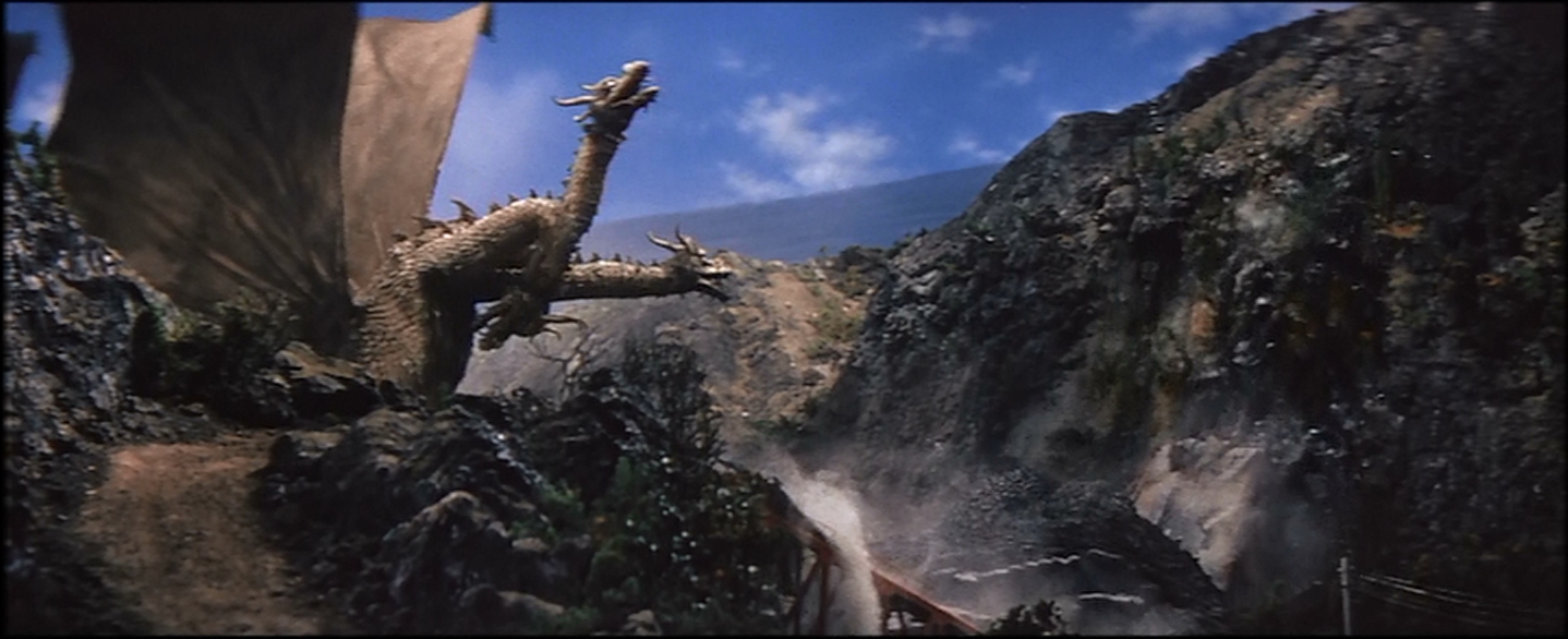 And down goes Godzilla, bridgework and all.