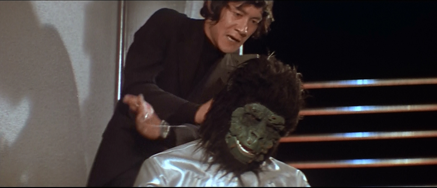 Mr. Secret Agent Strangles an... ape alien?