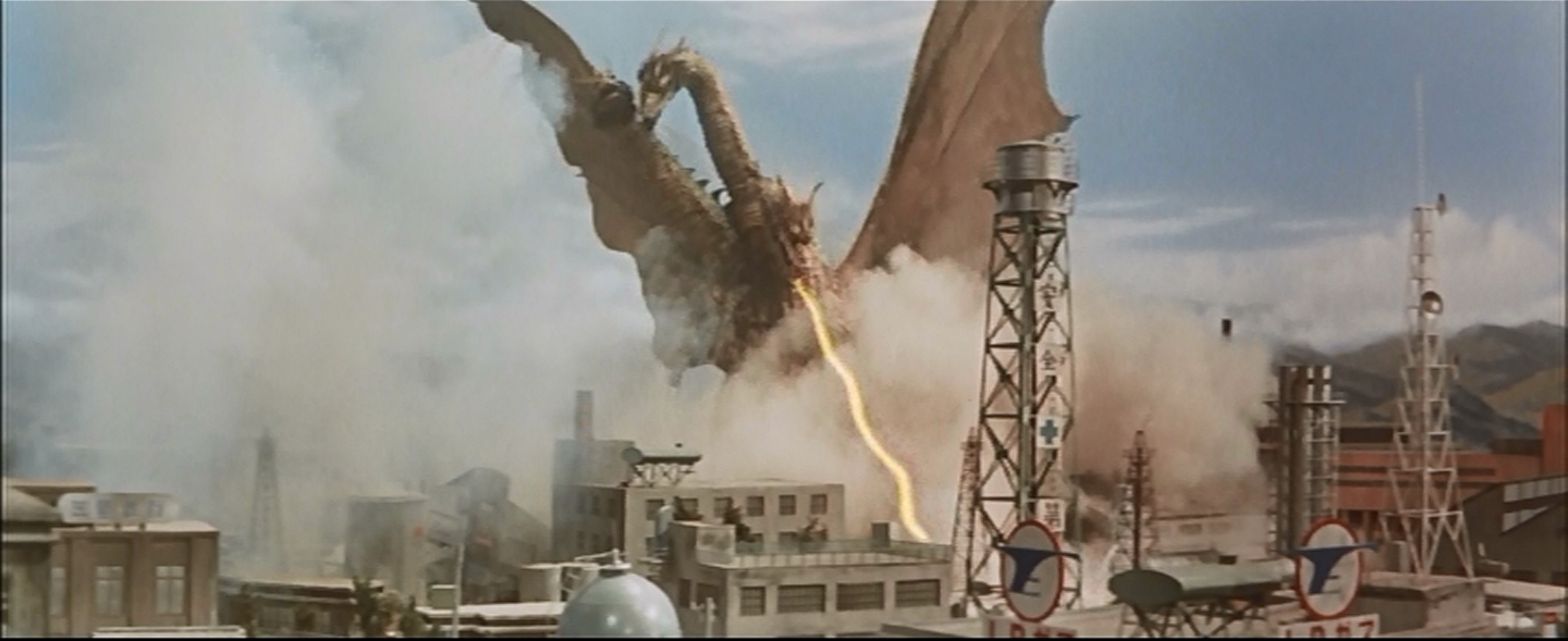 Ghidorah stomps a refinery. With antennas and stuff.