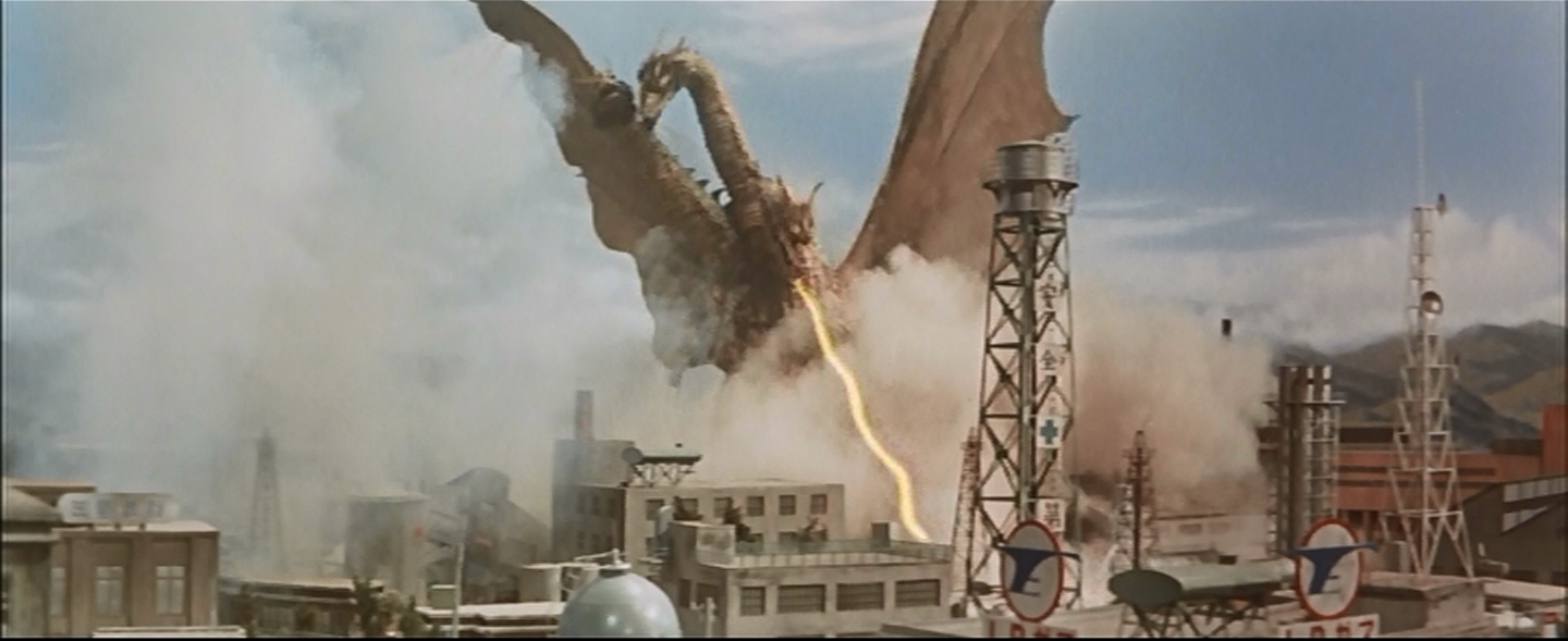 Ghidorah stomps a refinery.  With antennas and stuff.