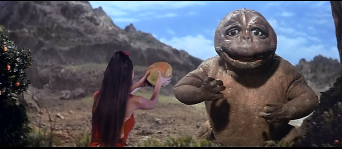 We'll have the sexy, wild woman feed fruit to Godzilla's son. YEAH, GENIUS!